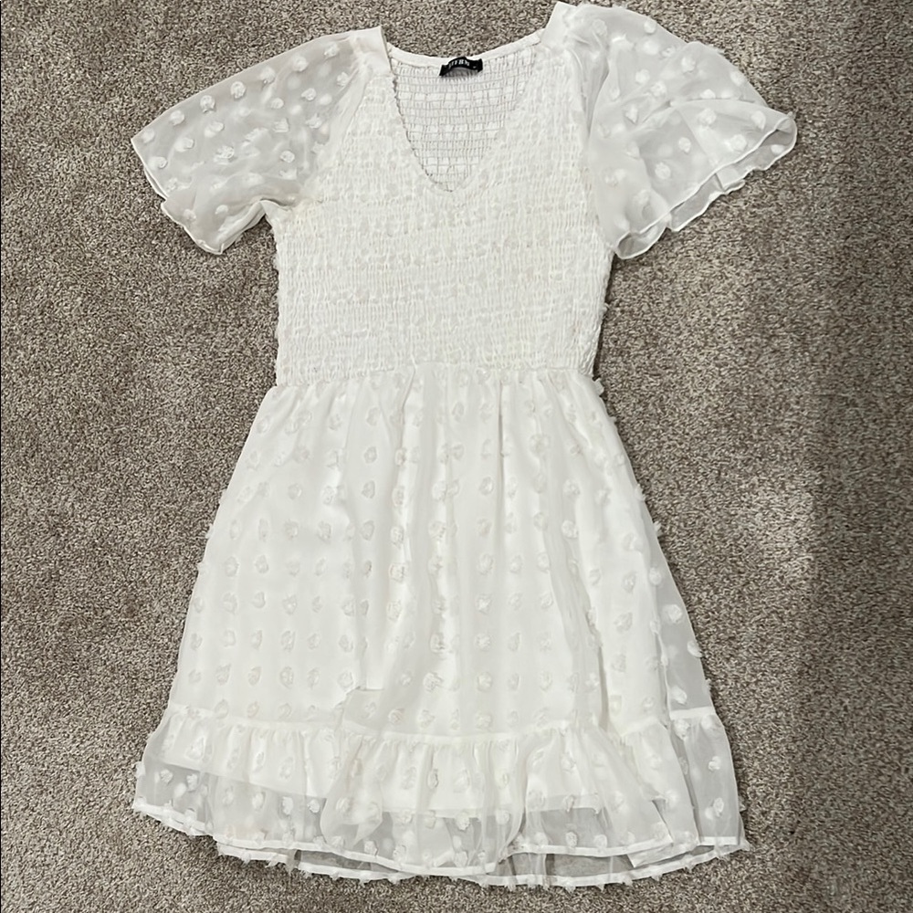 White women’s dress with ruffle Sleeves